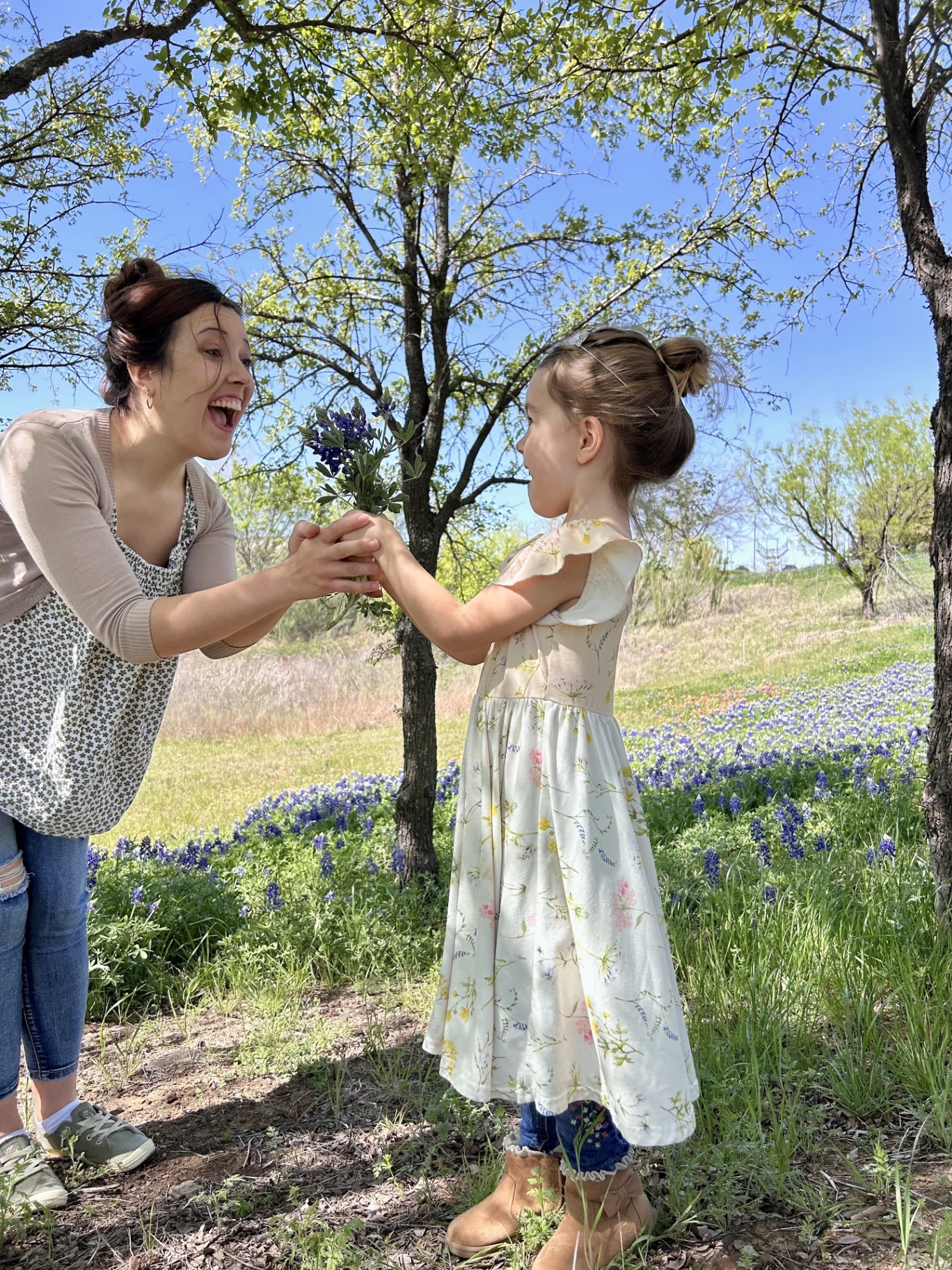 Alyssa sharing bluebonnets with her daughter